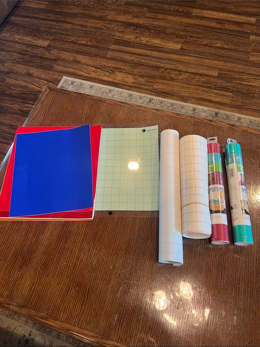 Cricut Vinyl Rolls in Teal, Magenta, Mint, and Red Grid